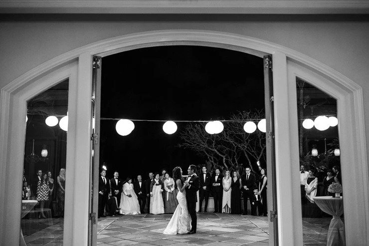 bride and groom share their first dance
