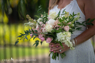 close up of a bouquet held by a Maui bride