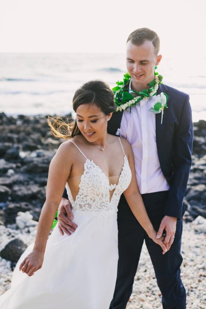 bride and groom overlooking the Maui ocean